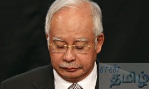 Malaysian prime minister Najib Razak announces that MH370 ended its journey in the Indian Ocean